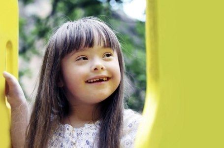 Little girl smiling after special needs dentistry visit