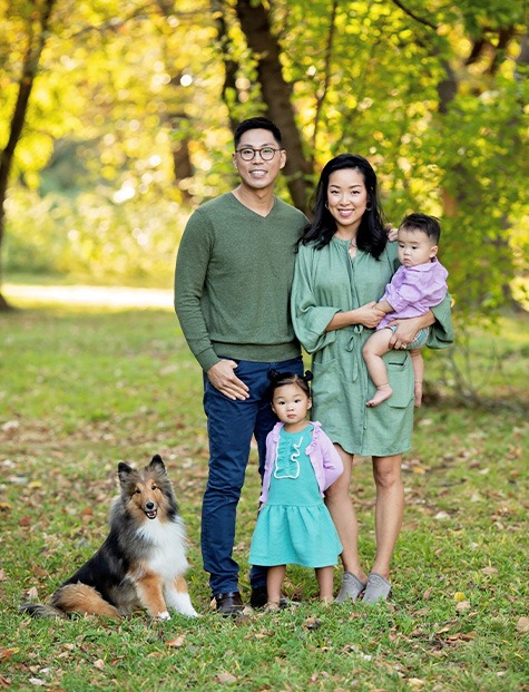 Doctor Yoo and his family outdoors in the fall