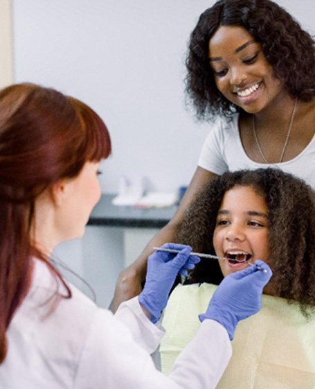 Young girl after receiving dental sealants in Allen 