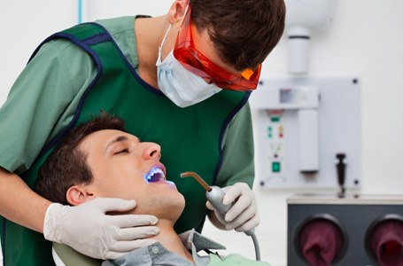 Teen receiving dental sealants in Allen  