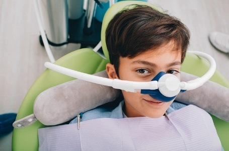 Child receiving nitrous oxide dental sedation