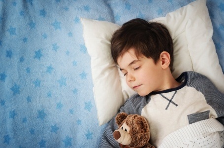 Child relaxing after oral conscious dental sedation visit
