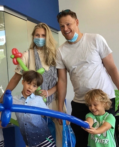 Parents and children smiling during pediatric dentistry visit