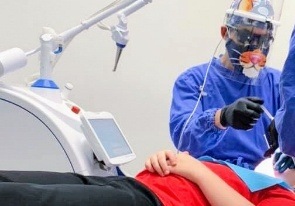 Pediatric dentist providing preventive dentistry