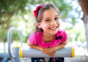 Young girl with healthy smile during cosmetic dentistry