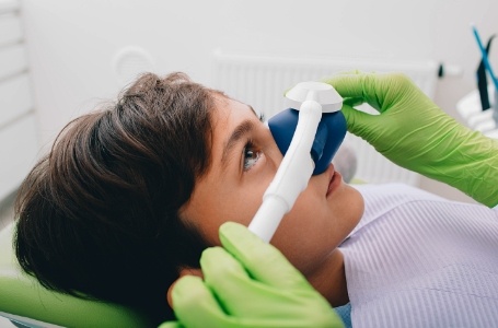 Young dental patient relaxing during airway and sleep apnea assessment