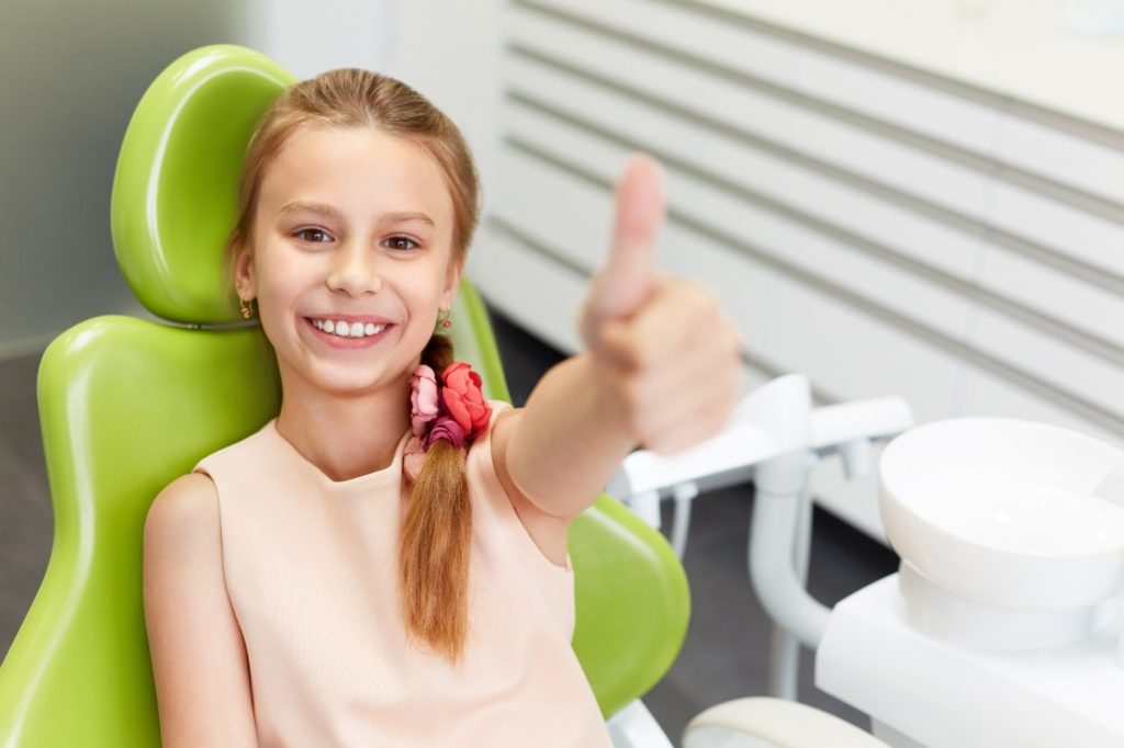 child at dentist  